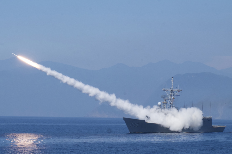 A Cheng Kung class frigate fires an anti air missile as part of a navy demonstration in Taiwan's annual Han Kuang exercises off the island's eastern coast near the city of Yilan, Taiwan on Tuesday, July 26, 2022. The Taiwanese capital Taipei staged a civil defense drill Monday and President Tsai Ing-wen on Tuesday attended the annual Han Kuang military exercises, although there was no direct connection with tensions over a possible visit by U.S.
