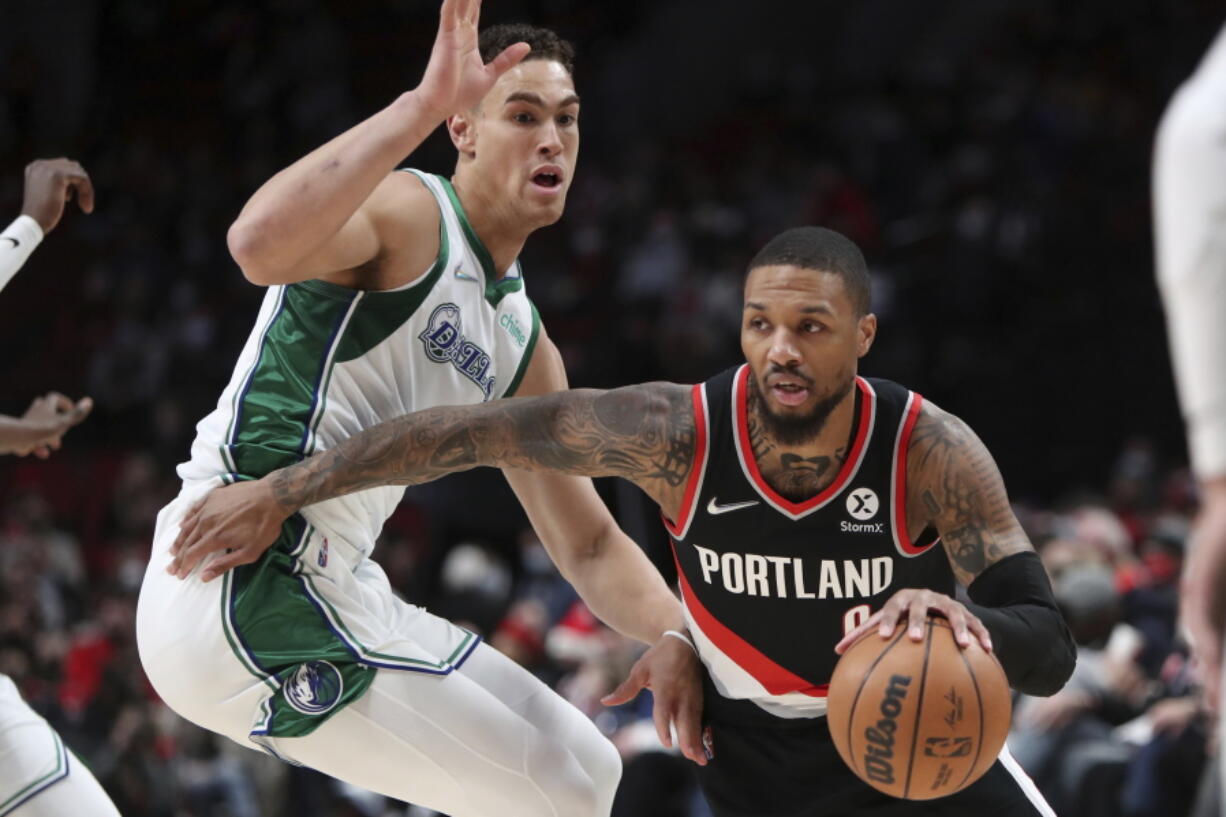 For Damian Lillard, right, staying with the Trail Blazers is a point of pride for the six-time All Star who has spent his whole career in Portland.