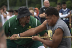 Rumble on the River linemen tug-o-war sports photo gallery