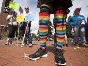 A woman wears rainbow socks at Saturday in the Park Pride in 2016.