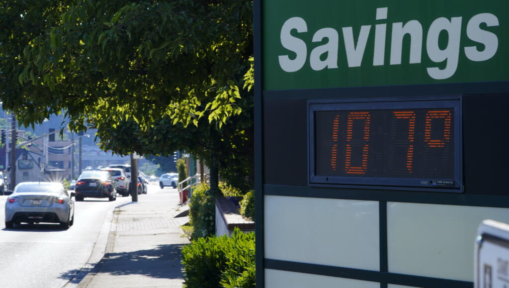 A display at an Olympia Federal Savings branch shows a temperature of 107 degrees Fahrenheit, Monday, June 28, 2021, in the early evening in Olympia, Wash. (AP Photo/Ted S.