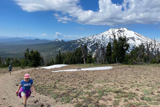 Cindy Morical, of Vancouver, Washington, hikes toward the summit of Tumalo Mountain earlier this month with Mount Bachelor in the background.
