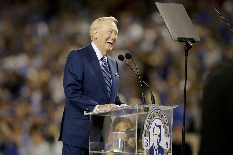 Hall of Fame Los Angeles Dodgers broadcaster Vin Scully speaks during Vin Scully Appreciation Day before the team's baseball game against the Colorado Rockies, Friday, Sept. 23, 2016, in Los Angeles. Scully's final game at Dodger Stadium will be Sunday. (AP Photo/Jae C.