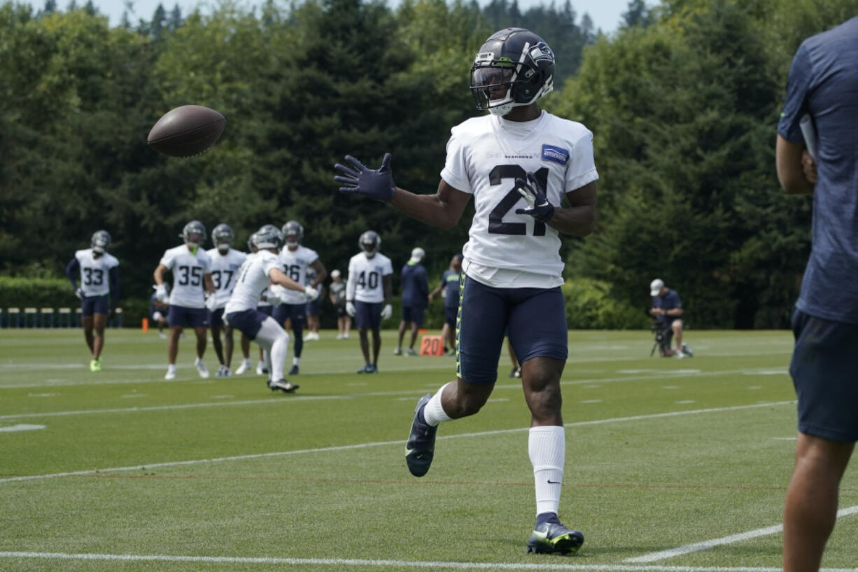 Seattle Seahawks cornerback Artie Burns runs a drill during NFL football practice Monday, Aug. 1, 2022, in Renton, Wash. (AP Photo/Ted S.