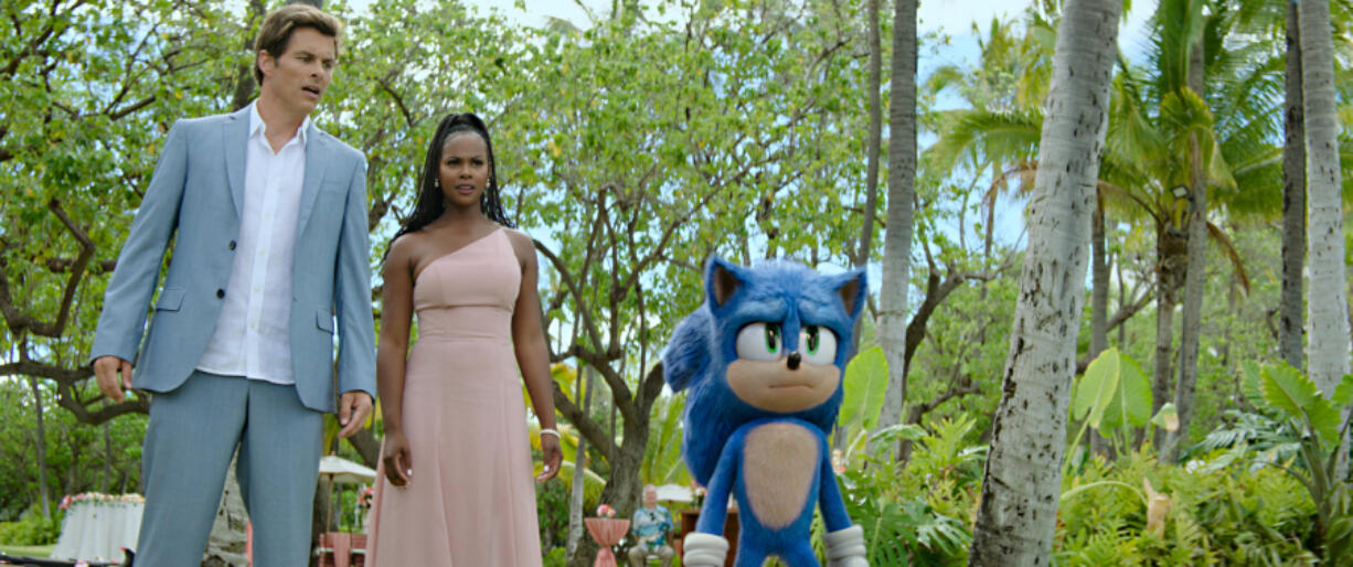 James Marsden, left, Tika Sumpter and Sonic (Ben Schwartz) in "Sonic the Hedgehog 2." (Courtesy Paramount Pictures and Sega of America/TNS)