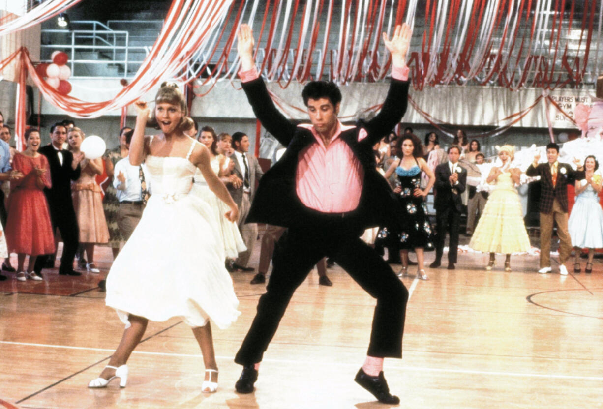 Olivia Newton-John, left, and John Travolta in a scene from the 1978 film "Grease." (Paramount Pictures via Library of Congress)