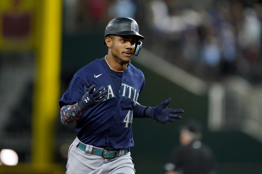 Seattle Mariners' Julio Rodriguez has missed 11 games since being hit on the wrist by a pitch July 30 in Houston.