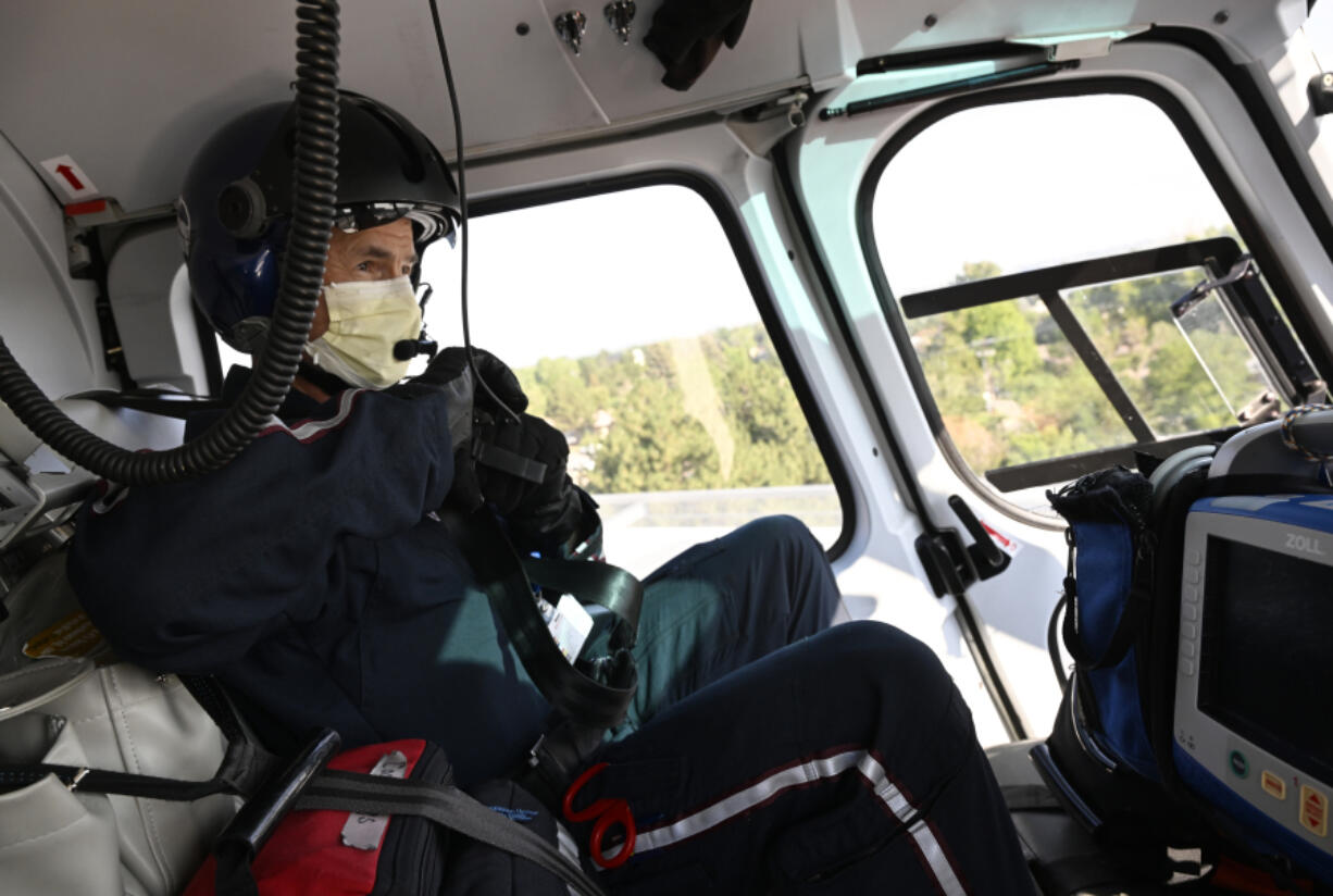 Flight nurse Duane Rorie prepares for a flight at North Colorado Medical Center on Aug. 1, 2022, in Greeley, Colorado. Med Evac is celebrating 40 years in Northern Colorado and took members of the media up for a short flight. Med Evac has flown more than 30,000 missions during those 40 years.