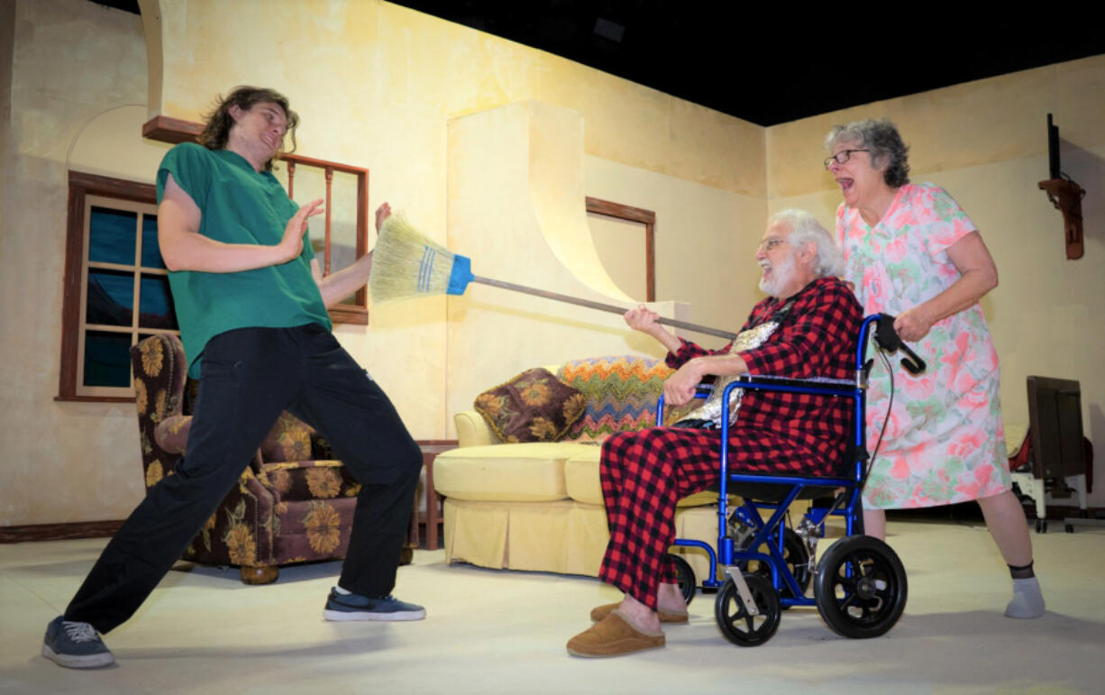 Adult group home worker Jimmy (Zane Jager, left) is just trying to do his job when he's attacked by knight-errant-wannabe Don Quintero (Christopher Cleveland) and his spunky friend Doris (Carol Radkins) in the dramatic comedy "Don Quixote de La Center." (Fetching Photos)