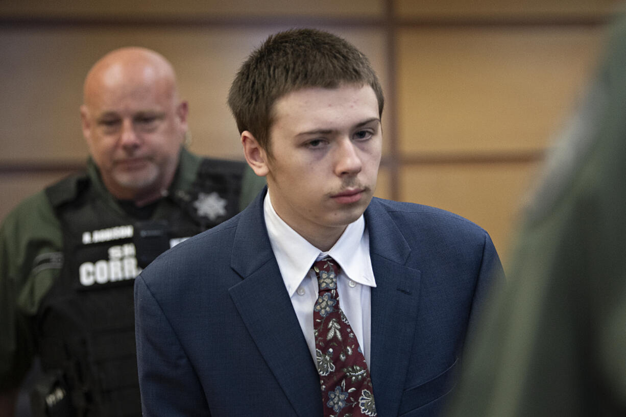 Brent Luyster Jr. makes his way into the courtroom for opening statements in his second-degree murder trial Tuesday at the Clark County Courthouse. Luyster Jr., who is the son of convicted triple murderer Brent Luyster, is accused of fatally stabbing his stepfather in May 2021 at an Amboy apartment.