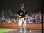 Raptors batter Riley McCarthy celebrates after scoring a run Tuesday, Aug. 9, 2022, during the Raptors’ 9-8 win against the Portland Pickles in Game 1 of the WCL playoffs at the Ridgefield Outdoor Recreation Complex.