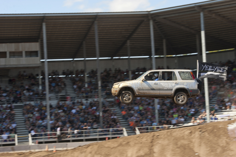 Zach Wallace of Battle Ground flies his Honda through the air as the crowd erupts in support of the driver.