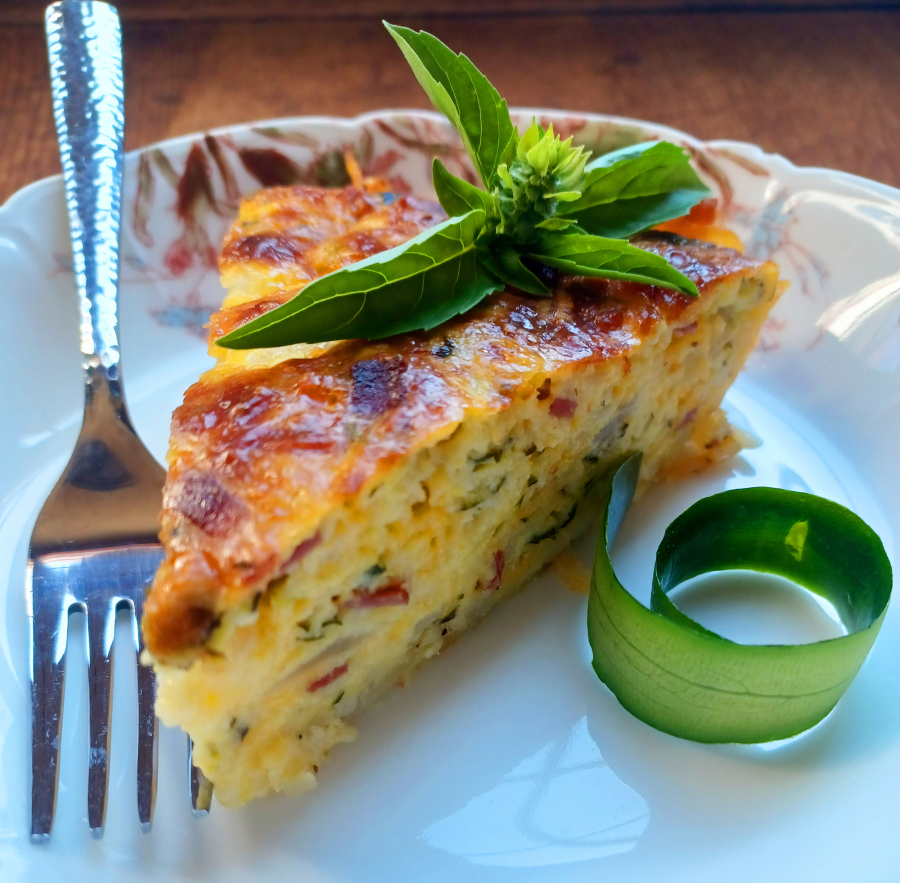 Don't know what to do with all those zukes? Put them in this cheesy zucchini, bacon and hash-brown pie.