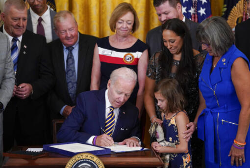 President Joe Biden signs the "PACT Act of 2022" during a ceremony in the East Room of the White House, Wednesday, Aug. 10, 2022, in Washington.