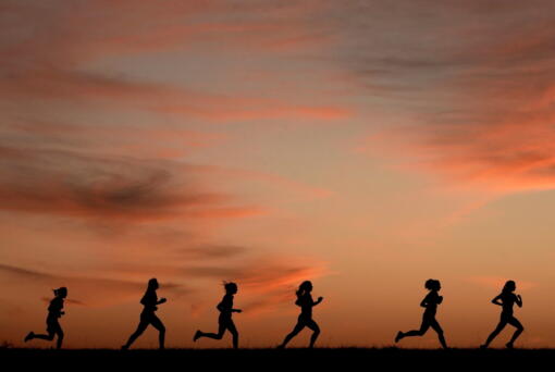 High school students run at sunset Feb. 28 in Shawnee, Kan. New research hints that even simple exercise just might help fend off memory problems.
