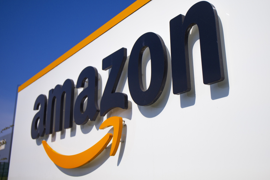 FILE - The Amazon logo is seen in Douai, northern France, April 16, 2020. In August 2022, Amazon has said it will spend billions of dollars in two gigantic acquisitions that, if approved, will broaden its ever growing presence in the lives of consumers.