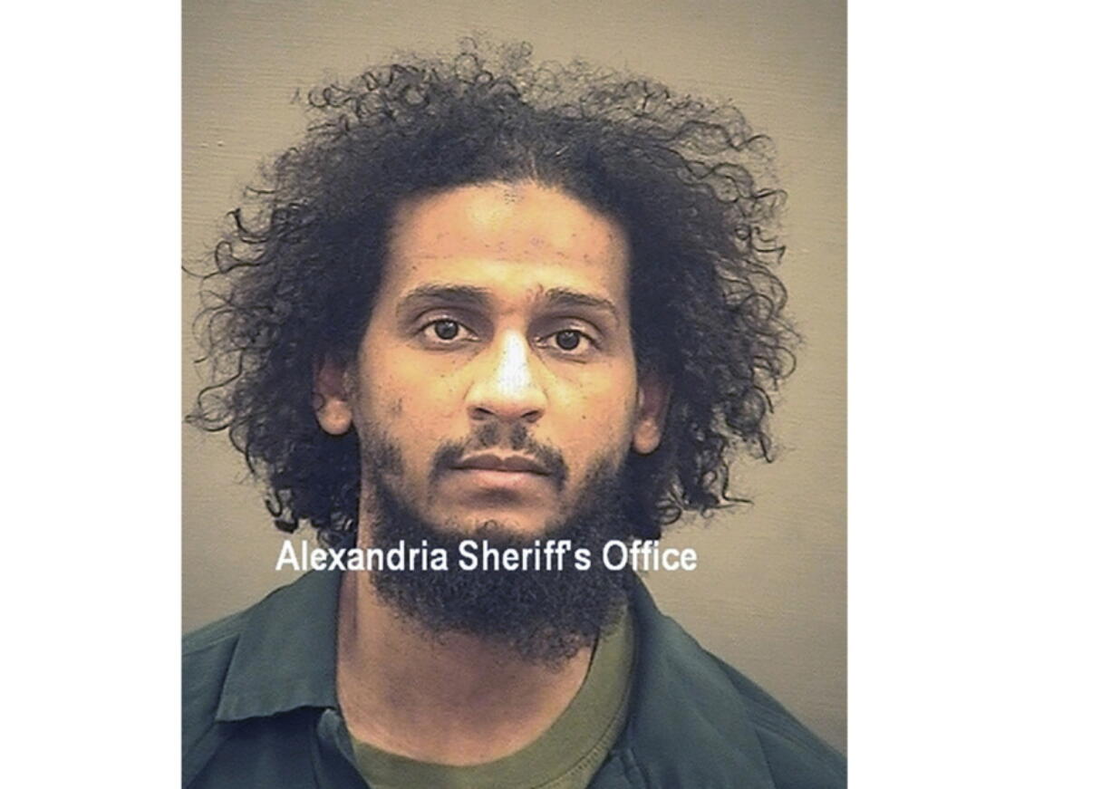 FILE - In this photo provided by the Alexandria Sheriff's Office is El Shafee Elsheikh who is in custody at the Alexandria Adult Detention Center, Oct. 7, 2020, in Alexandria, Va.   Elsheikh has been sentenced to life in prison for his role in the deaths of four U.S. hostages captured by the Islamic State. Prosecutors say El Shafee Elsheikh is the most notorious member of the Islamic State ever to be convicted at trial in a U.S. court.