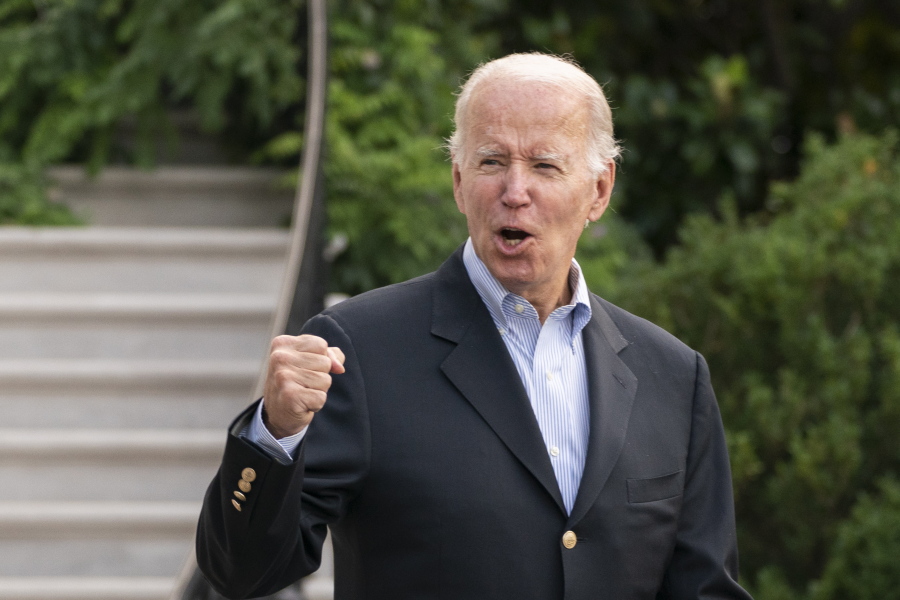 President Joe Biden responds to reporters questions as he walks to board Marine One on the South Lawn of the White House in Washington, on his way to his Rehoboth Beach, Del., home after his most recent COVID-19 isolation, Sunday, Aug. 7, 2022.
