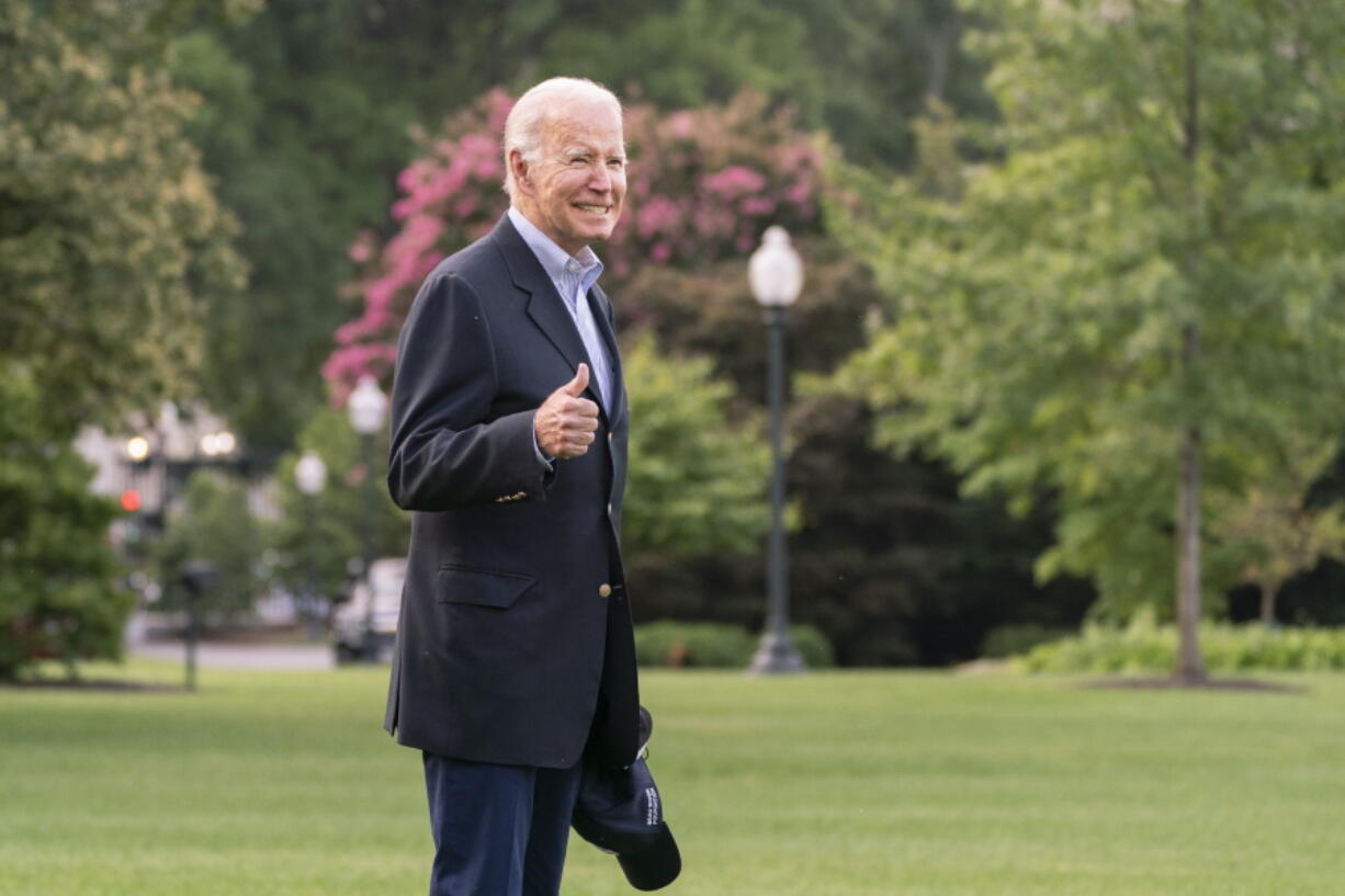 President Joe Biden walks to board Marine One on the South Lawn of the White House in Washington, on his way to his Rehoboth Beach, Del., home after his most recent COVID-19 isolation, Sunday, Aug. 7, 2022.