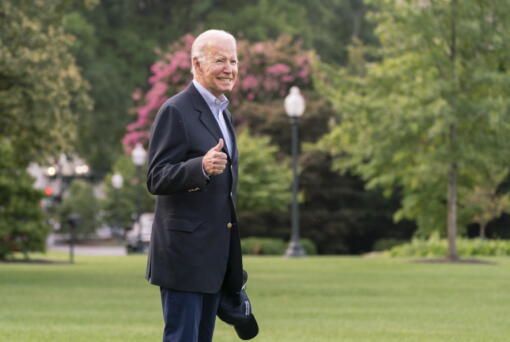 President Joe Biden walks to board Marine One on the South Lawn of the White House in Washington, on his way to his Rehoboth Beach, Del., home after his most recent COVID-19 isolation, Sunday, Aug. 7, 2022.