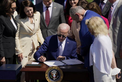 President Joe Biden signs into law H.R. 4346, the CHIPS and Science Act of 2022, at the White House in Washington, Tuesday, Aug. 9, 2022.