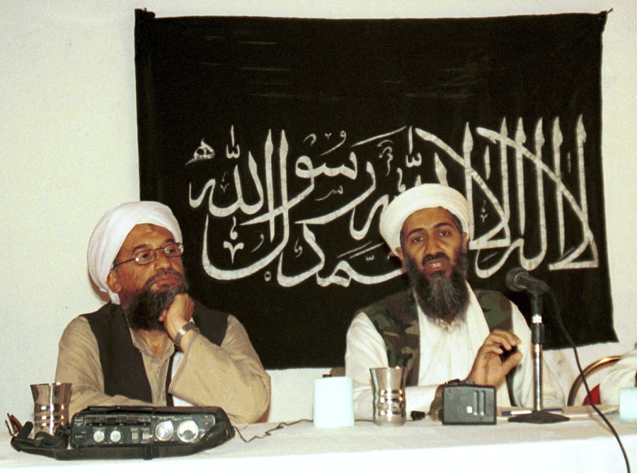 FILE - In this 1998 file photo made available Friday, March 19, 2004, Ayman al-Zawahri, left, listens during a news conference with Osama bin Laden in Khost, Afghanistan. A U.S. airstrike has killed al-Qaida leader Ayman al-Zawahri in Afghanistan, according to a person familiar with the matter. President Joe Biden will speak about the operation on Monday night, Aug. 1, 2022, from the White House.