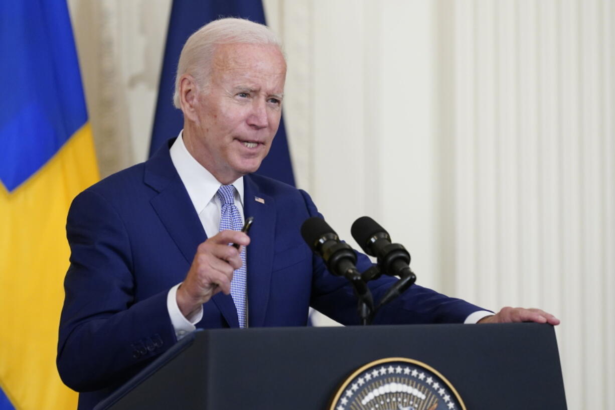 FILE - President Joe Biden speaks in the East Room of the White House in Washington, Tuesday, Aug. 9, 2022. Climate activists are clamoring for President Joe Biden to declare a national climate emergency, calls the White House has so far not headed.