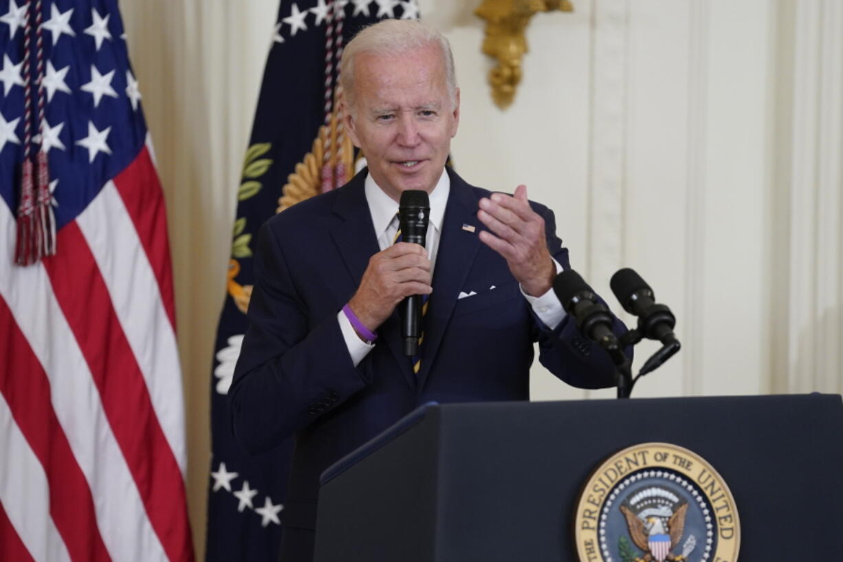 FILE - President Joe Biden speaks during an event in the East Room of the White House, Aug. 10, 2022, in Washington.