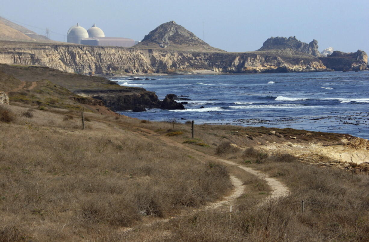 FILE - The Diablo Canyon Nuclear Power Plant, south of Los Osos, Calif., is viewed Sept. 20, 2005. California's last operating nuclear power plant could get a second lease on life. Owner Pacific Gas & Electric decided six years ago to close the twin-domed power plant by 2025. But Democratic Gov. Gavin Newsom, who was involved in the agreement to close the reactors, has prompted PG&E to consider seeking a longer lifespan for the plant. (AP Photo/Michael A.
