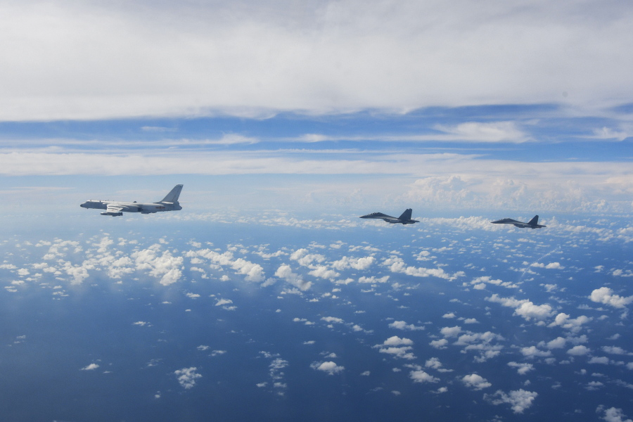 FILE - In this photo released by Xinhua News Agency, aircraft of the Eastern Theater Command of the Chinese People's Liberation Army (PLA) conduct a joint combat training exercises around the Taiwan Island on Sunday, Aug. 7, 2022. China on Thursday, Aug. 11, 2022, renewed its threat to attack Taiwan following almost a week of wargames near the island.
