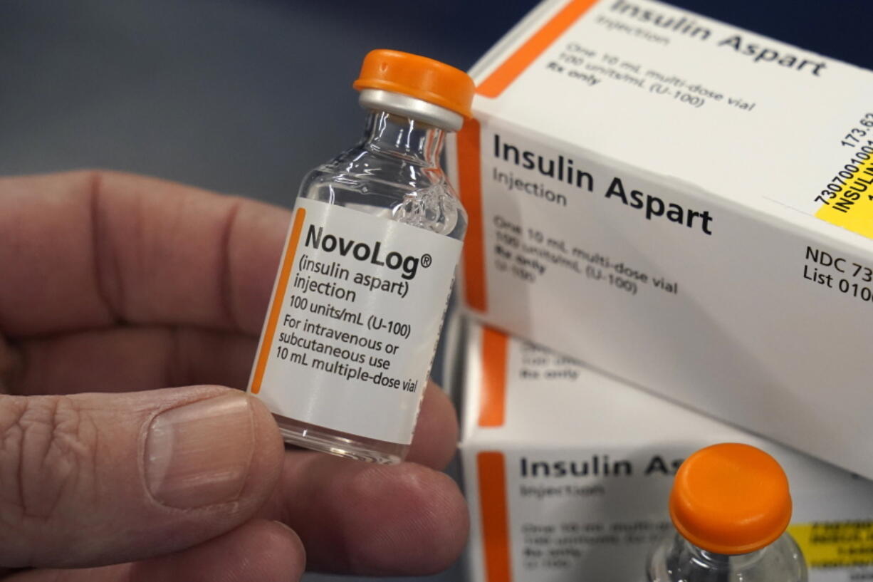 FILE - Insulin is displayed at Pucci's Pharmacy in Sacramento, Calif., July 8, 2022. Senate Majority Leader Chuck Schumer, D-N.Y. said this week that Democrats planned to add language to the economic package focused on climate and health care that will be aimed at reducing patients' costs of insulin, the diabetes drug that can cost hundreds of dollars monthly.