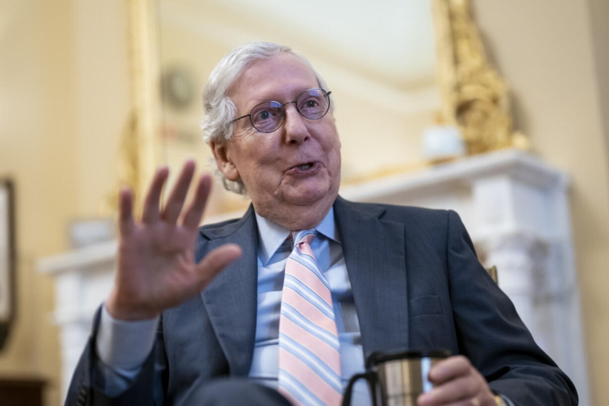 Senate Minority Leader Mitch McConnell, R-Ky., discusses NATO expansion and other issues during an Associated Press interview in his office at the Capitol in Washington, Wednesday, Aug. 3, 2022. (AP Photo/J.
