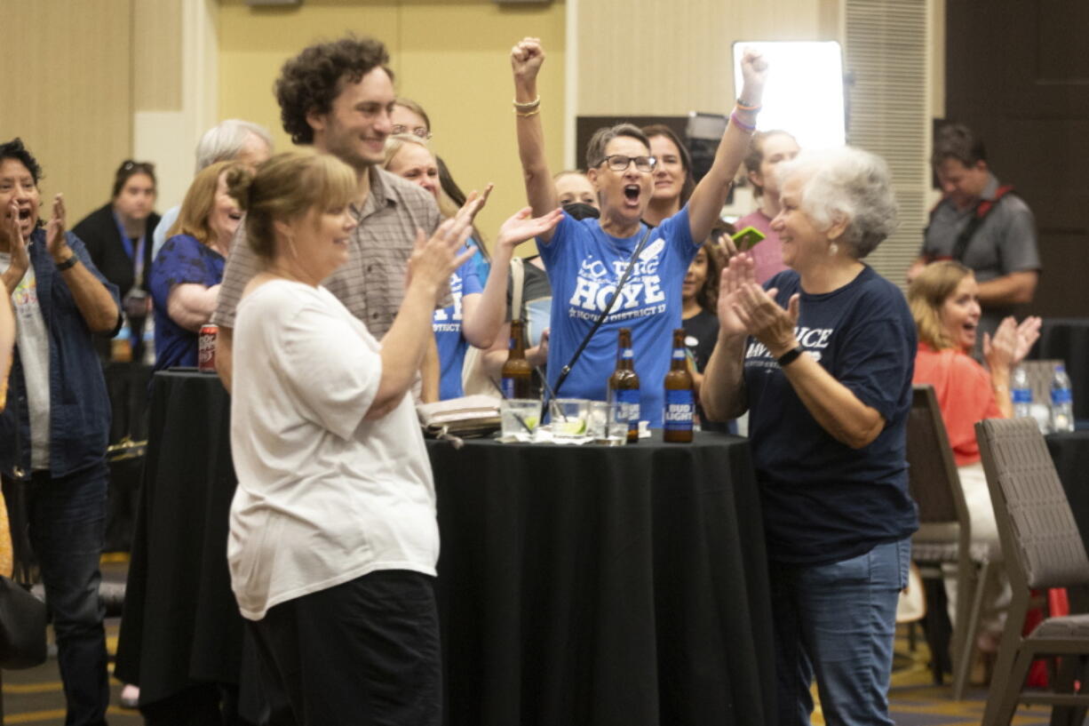 Abortion-rights supporters rejoice as early polls indicate the proposed constitutional amendment in Kansas has not passed late Tuesday, Aug. 2, 2022, at a Kansans for Constitutional Freedom election watch party at the Overland Park Convention Center in Overland Park, Kan.