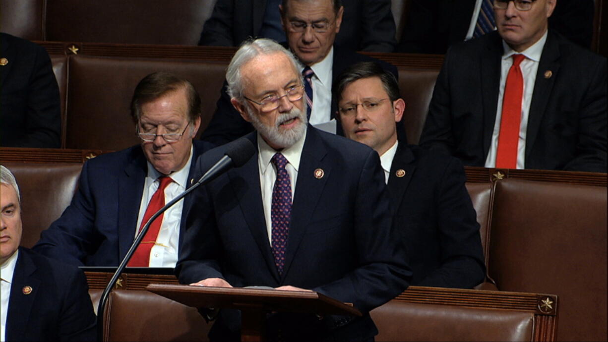 FILE - Rep. Dan Newhouse, R-Wash., speaks as the House of Representatives debates the articles of impeachment against President Donald Trump at the Capitol in Washington on Dec. 18, 2019. Newhouse was one of 10 Republicans who voted to impeach Trump last year, and is one of only two to beat back GOP challengers this year.