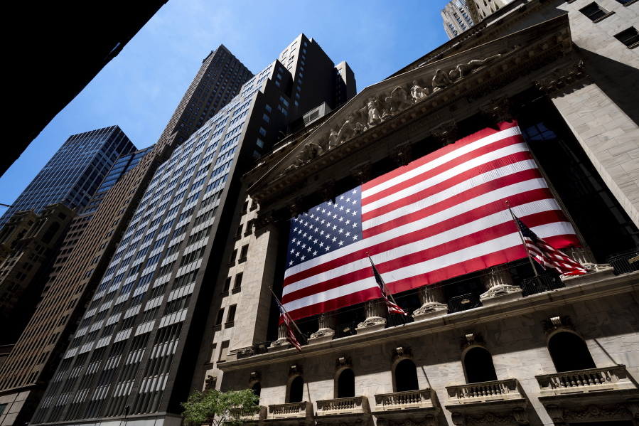 FILE - The New York Stock Exchange on Wednesday, June 29, 2022, in New York. Stocks on Wall Street recovered from early losses and turned higher in afternoon trading Monday, Aug. 15, 2022, as investors remain focused on the economy and on several updates from retailers this week.