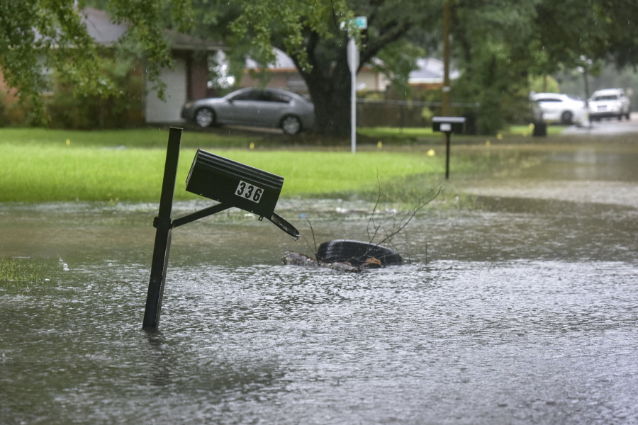 A mailbox stands in floodwaters from heavy rains that have plagued the region in recent days on Foxboro Drive in northeast Jackson, Miss., Wednesday, Aug. 24, 2022. Torrential rains and flash flooding prompted rescue operations, closures and evacuations in the central part of the state.