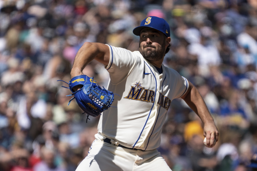 Seattle Mariners starter Robbie Ray delivers a pitch during the first inning of a baseball game against the Cleveland Guardians, Sunday, Aug. 28, 2022, in Seattle.