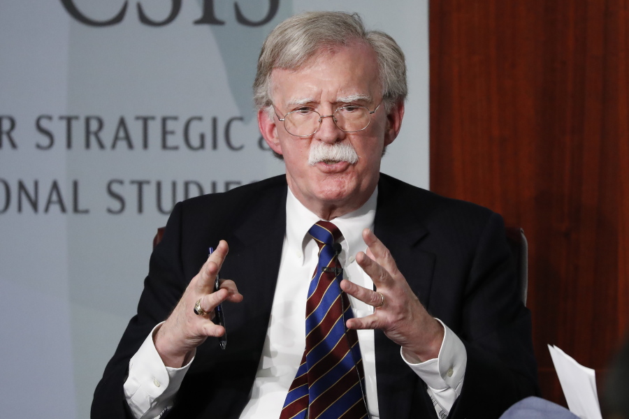 FILE - Former National security adviser John Bolton gestures while speaking at the Center for Strategic and International Studies (CSIS) in Washington, Sept. 30, 2019. The Justice Department says an Iranian operative has been charged in a plot to murder former Trump administration national security John Bolton.