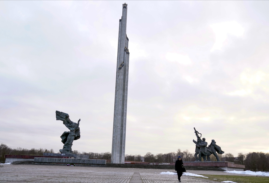 FILE - The Monument to the Liberators of Soviet Latvia and Riga from the German Fascist Invaders stands, in Riga, Latvia, Feb. 23, 2022. A Soviet-era monument, commemorating the Red Army's victory over Nazi Germany, that stands like a high-rise in a park in the Latvian capital of Riga will be torn down on Tuesday, Aug. 23, 2022, authorities said.