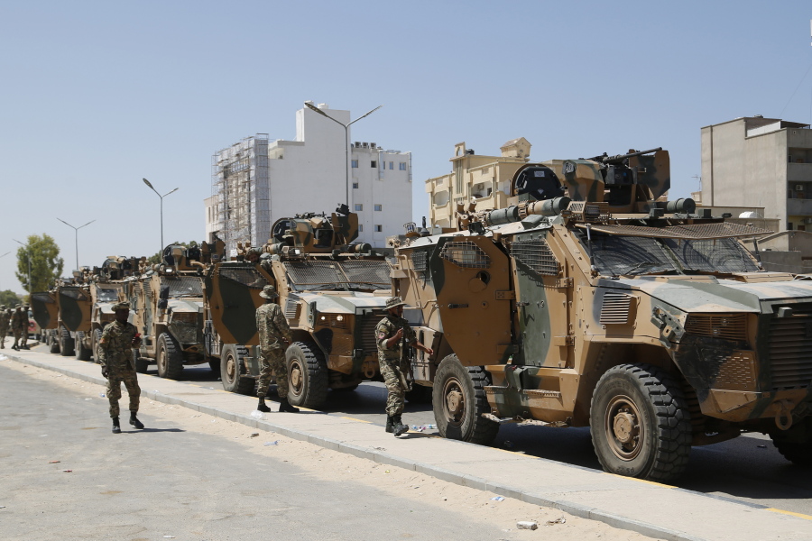 Libyan forces are deployed in Tripoli, Libya, Saturday, Aug. 27, 2022. Clashes broke out early Saturday between rival militias in Libya's capital, a health official said.
