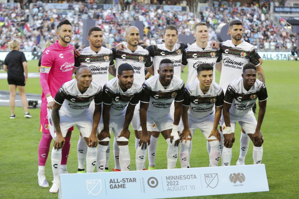 Liga MX All-Stars starters pose for a team photo before taking on the MLS All-Stars in the MLS All-Star soccer match Wednesday, Aug. 10, 2022, in St. Paul, Minn.