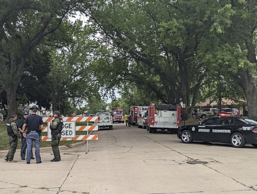 Barricades block off a portion of Elm Street in Laurel, Neb., Thursday, Aug. 4, 2022. The Nebraska State Patrol is investigating a situation with multiple fatalities that occurred in Laurel on Thursday morning. Emergency personnel from the state patrol, Belden and the Cedar County Sheriff's Department were working in the area.