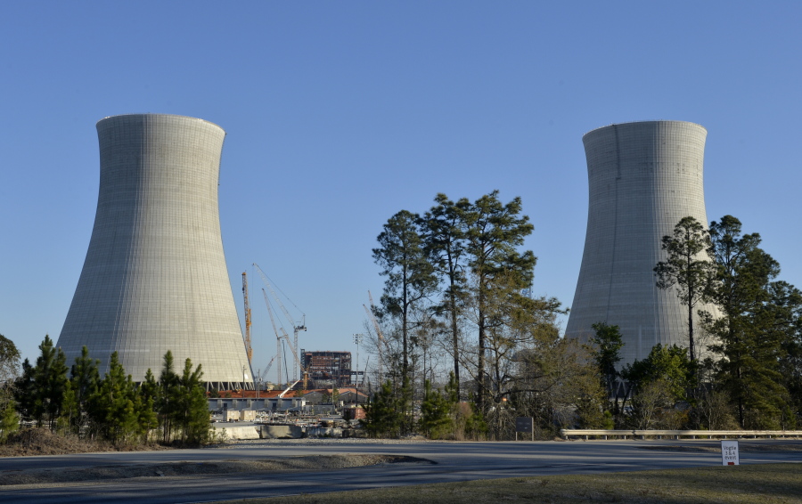 FILE - The cooling towers of two new nuclear reactors at Plant Vogtle in Waynesboro, Ga., are pictured Friday, March 22, 2019. The U.S. Nuclear Regulatory Commission announced Wednesday, Aug. 3, 2022, that it had approved plans to load radioactive fuel into one of the new reactors, which could clear the way for the first new nuclear power plant built in the United States in decades to come online by March 2023.