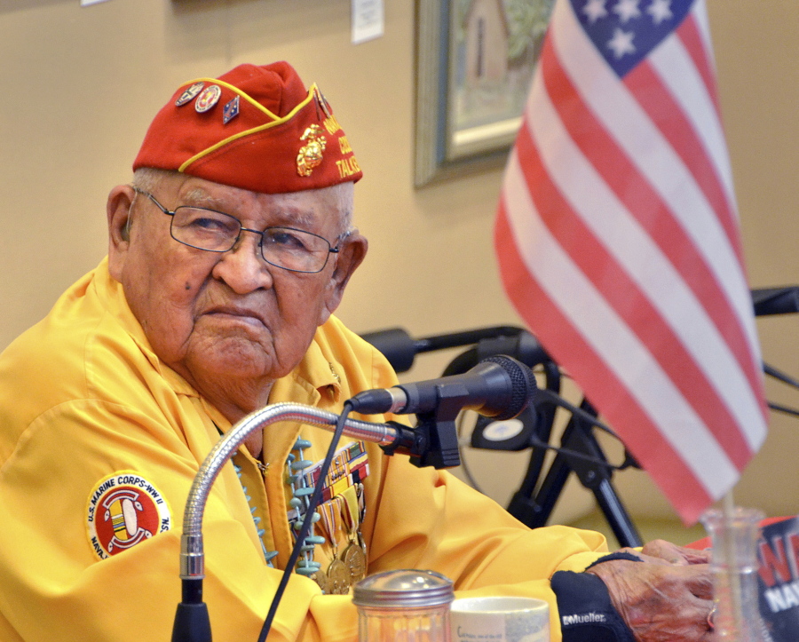 FILE - In this 2013 photo, Navajo Code Talker Samuel Sandoval talks about his experiences in the military in Cortez, Colo. Sandoval, one of the last remaining Navajo Code Talkers who transmitted messages in World War II using a code based on their native language, has died at age 98. Sandoval died late Friday, July 29, 2022, at a hospital in Shiprock, N.M., his wife, Malula told The Associated Press on Saturday.