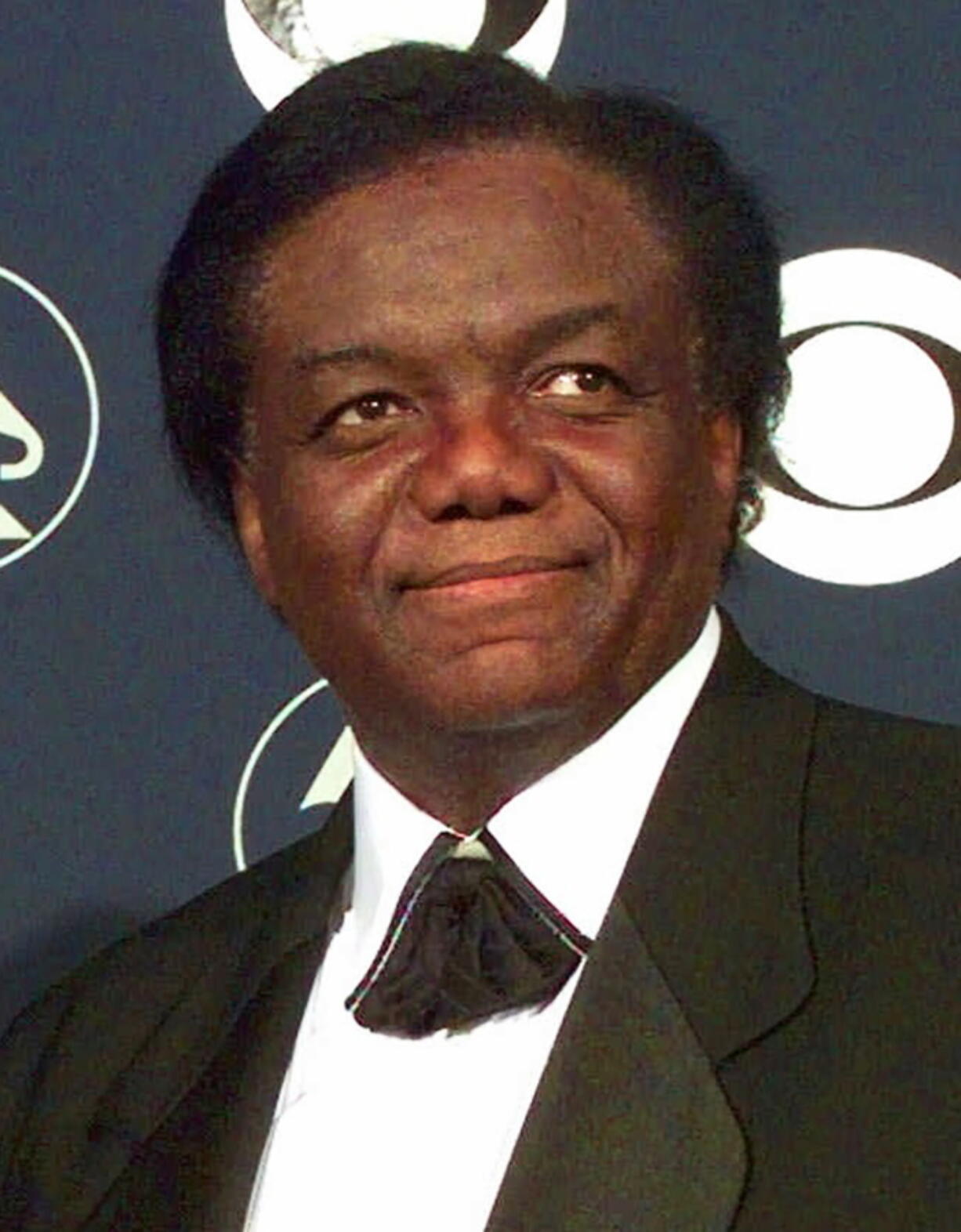 FILE - Songwriter/producer Lamont Dozier appears at the 40th Annual Grammy Awards in New York on Feb. 25, 1998. Dozier, of the celebrated Holland-Dozier-Holland team that wrote and produced "You Can't Hurry Love," "Heat Wave" and dozens of other hits and helped make Motown an essential record company of the 1960s and beyond, has died at age 81.