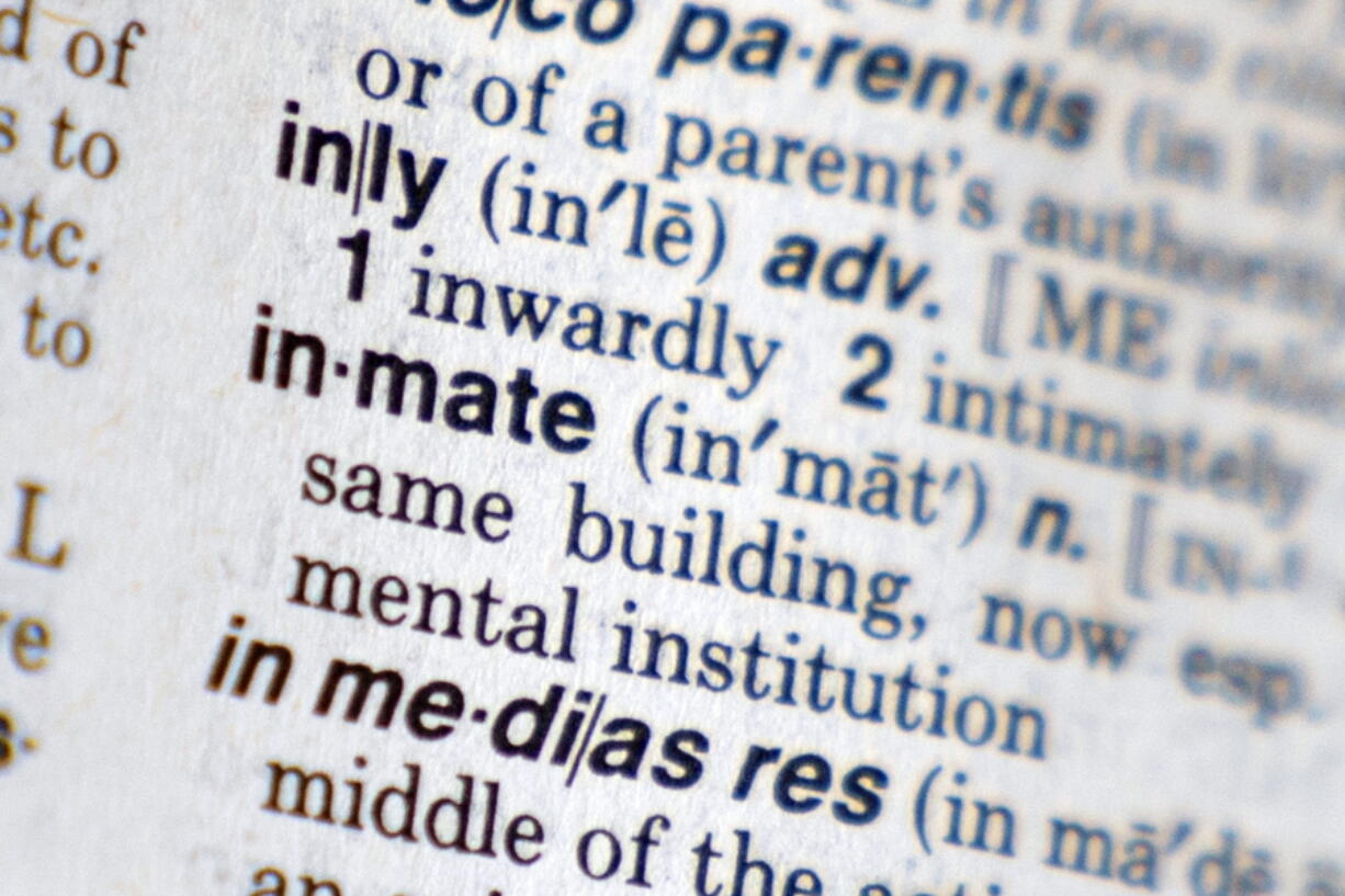 The word "inmate" appears in Webster's New World Dictionary in New York, Thursday, Aug. 11, 2022. New York has amended a series of state laws to remove the word "inmate" and replace it with "incarcerated person" to refer to people serving prison time. The changes, signed into law by Gov. Kathy Hochul, are intended to reduce the stigma of being in being in jail. Republicans ridiculed the measure as coddling criminals.