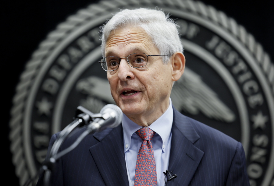 Attorney General Merrick Garland speaks during an event to swear in the new director of the federal Bureau of Prisons Colette Peters at BOP headquarters in Washington, Tuesday, Aug. 2, 2022. The Justice Department is suing Idaho, arguing that its new abortion law violates federal law because it does not allow doctors to provide medically necessary treatment, Garland said Tuesday.
