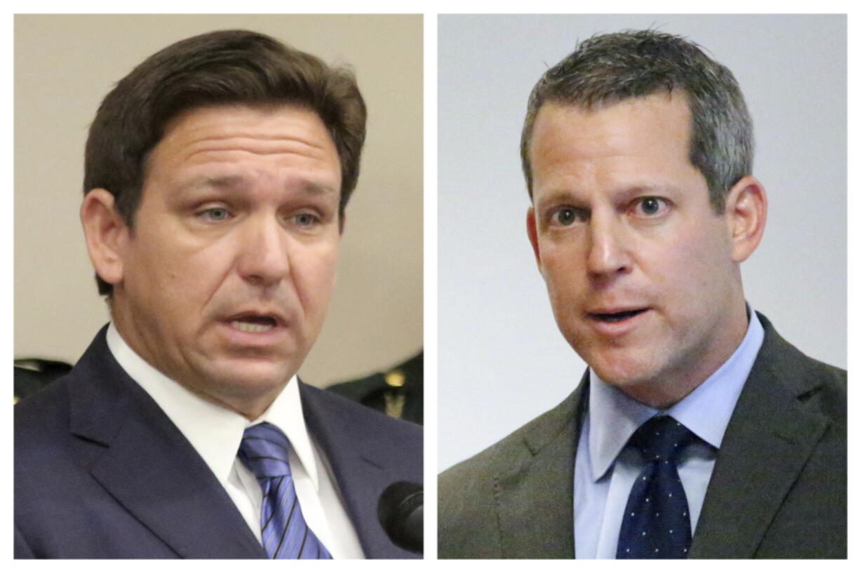 This combination of Thursday, Aug. 4, 2022 photos shows Florida Gov. Ron DeSantis, left, and Hillsborough County State Attorney Andrew Warren during separate news conferences in Tampa, Fla. On Sunday, Aug. 7, 2022, Warren vowed to fight his suspension from office by DeSantis over his promise not to enforce the state's 15-week abortion ban and support for gender transition treatments for minors. (Douglas R.