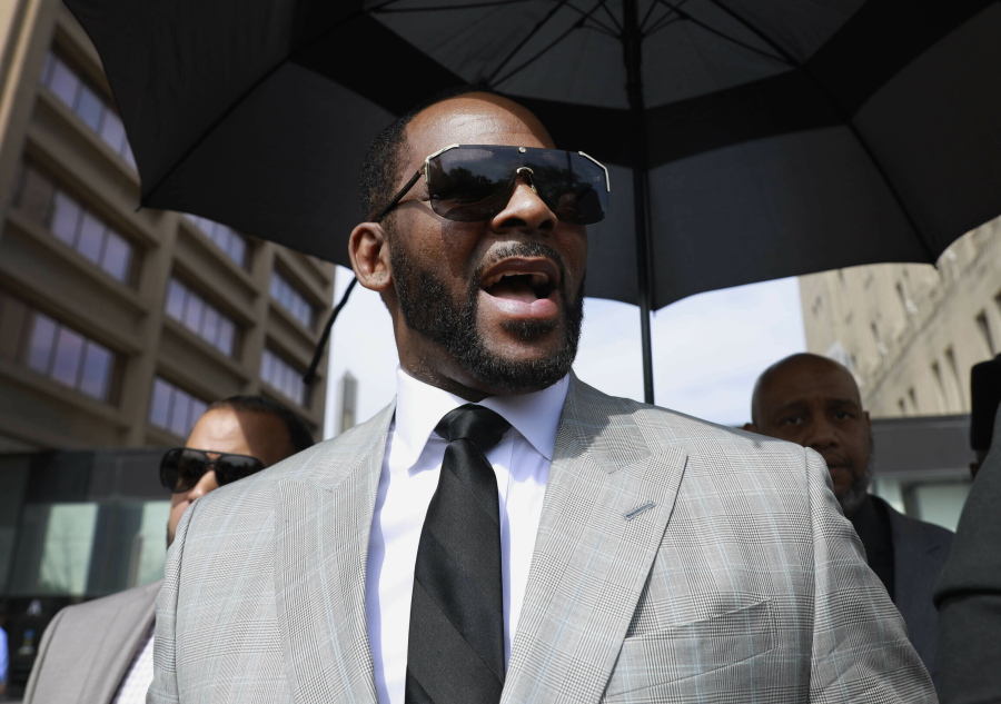 FILE - Musician R. Kelly leaves the Leighton Criminal Court building in Chicago on June 6, 2019. Kelly's federal trial starts Monday in Chicago.