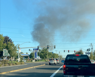 A fire on state Highway 500 sent a huge plume of smoke into the air on Friday morning.